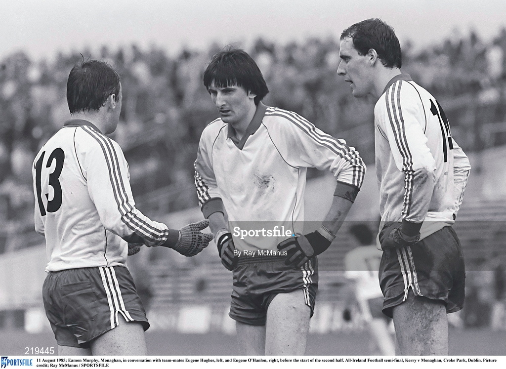 11 August 1985; Eugene O'Hanlon of Monaghan in conversation with team-mates Eugene Hughes, left, and Eamon Murphy, right, before the start of the second half during the All-Ireland Football semi-final match between Kerry and Monaghan at Croke Park, Dublin. Photo by Ray McManus/Sportsfile