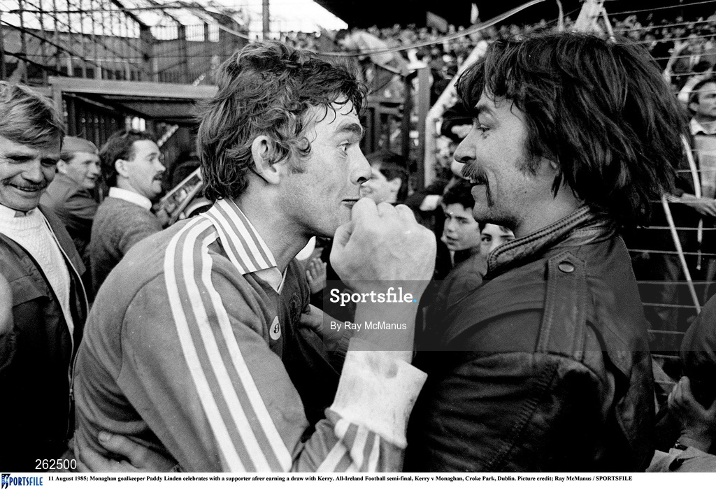 11 August 1985; Monaghan goalkeeper Paddy Linden celebrates with a supporter after earning a draw with Kerry after the All-Ireland Football semi-final match between Kerry and Monaghan at Croke Park, Dublin. Photo by Ray McManus/Sportsfile