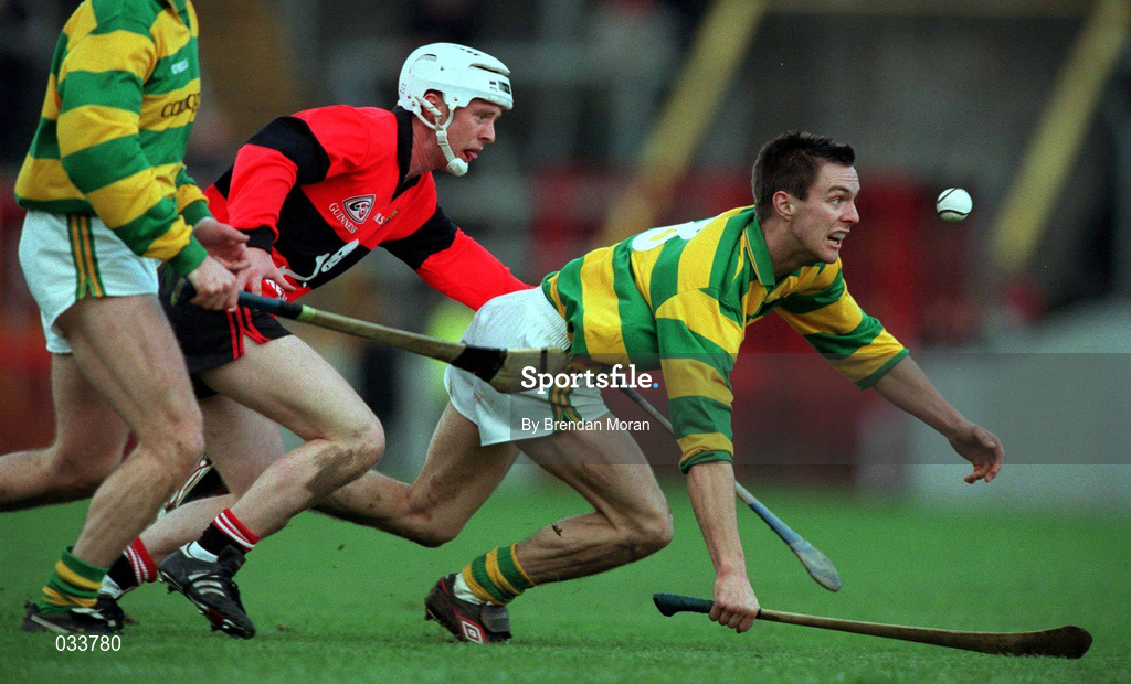31 October 1999; Alan Cummins of Blackrock gathers possession ahead of Johnny Enright of UCC during the Cork County Senior Club Hurling Championship Final match between Blackrock and UCC at Páirc Uí Chaoimh in Cork. Photo by Brendan Moran/Sportsfile