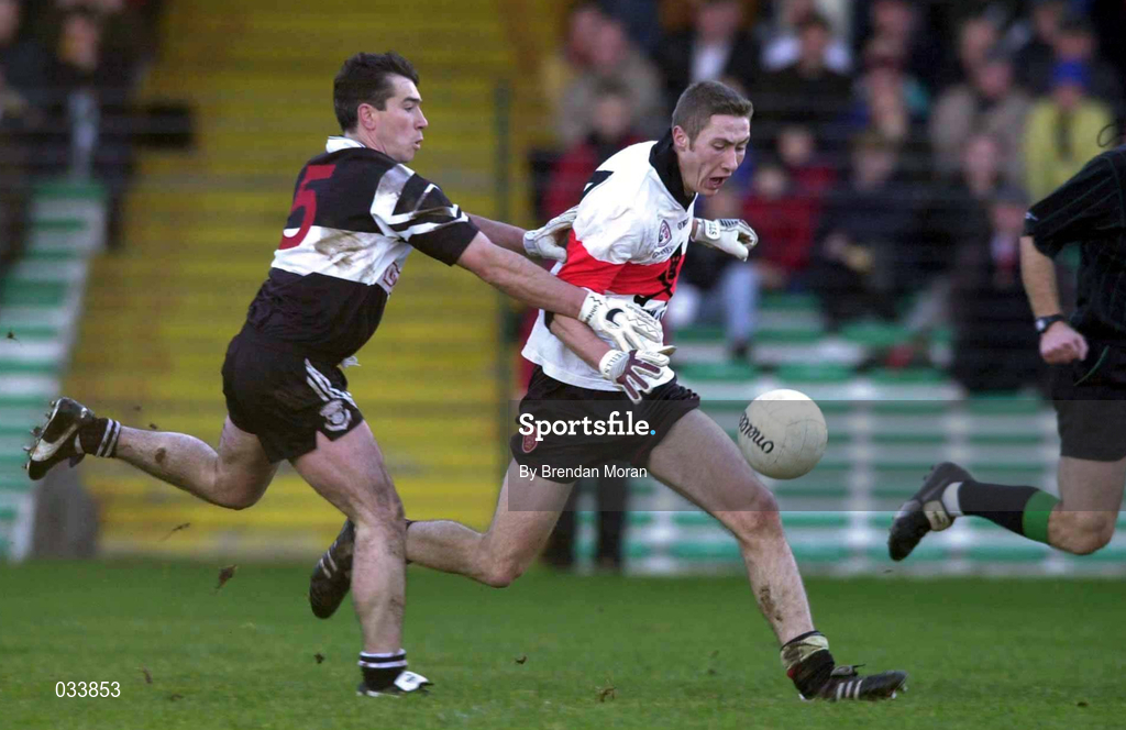 12 December 1999; Billy Sheehan of UCC in action against Declan Conway of Doonbeg during the AIB Munster Senior Club Football Championship Final match between UCC and Doonbeg at the Gaelic Grounds in Limerick. Photo by Brendan Moran/Sportsfile