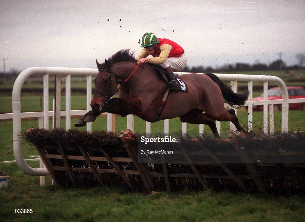 16 January 2000; Bobbyjo, with Paul Carberry up, clears the 'last', first time round, ahead of the field during the Teal Handicap Hurdle at Fairyhouse Racecourse in Meath. Photo by Ray McManus/Sportsfile