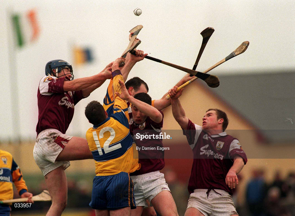 27 February 2000; Alan Markham, 12, and Ollie Baker of Clare contest a dropping ball with Galway players, from left, Liam Hodgkins, Padraig Walsh and Rory Gantley during the Allianz National Hurling League Division 1A Round 2 match between Clare and Galway at Hennessy Park in Miltown Malbay, Clare. Photo by Damien Eagers/Sportsfile