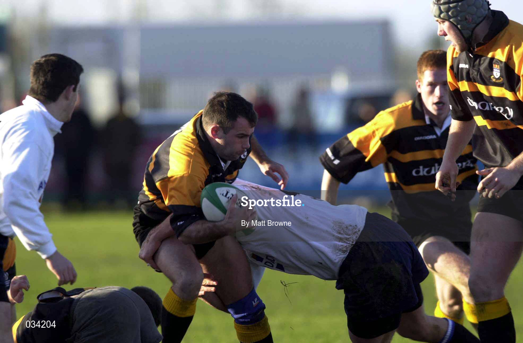 4 December 1999; Steve McIvor of Buccaneers is tackled by Ronan O'Gara of Cork Constitution during the AIB Rugby League Division 1 match between Buccaneers and Cork Constitution at Buccaneers RFC in Athlone, Westmeath. Photo by Matt Browne/Sportsfile