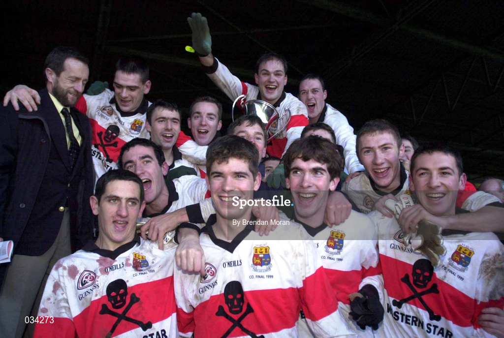 12 December 1999; UCC players celebrate after the AIB Munster Senior Club Football Championship Final match between UCC and Doonbeg at the Gaelic Grounds in Limerick. Photo by Brendan Moran/Sportsfile