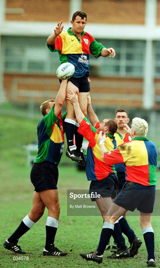 8 June 1999; Dion O'Cuinneagain, gets the ball away to  scrum half Ciarán Scally with help from Jeremy Davidson, left, and Peter Clohessy during Ireland Rugby squad training at Brisbane Grammar School in Brisbane, Queensland, Australia. Photo by Matt Browne/Sportsfile