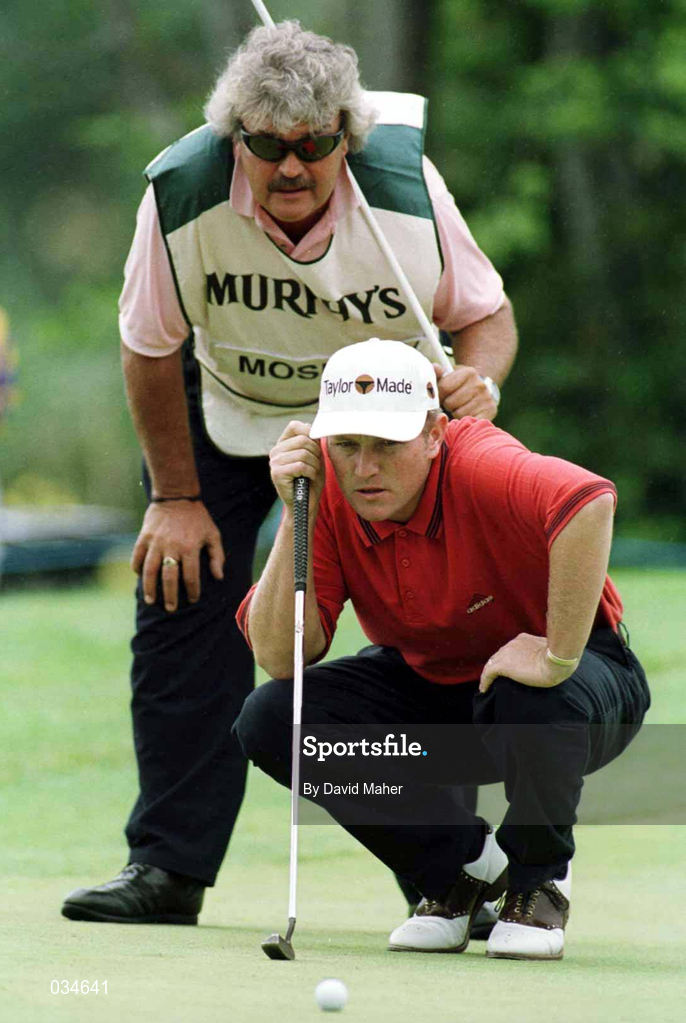 3 July 1999; Jarrod Moseley lines up a putt with the help of his caddy at the 3rd green during day three of the Murphy's Irish Open at Druids Glen in Wicklow. Photo by David Maher/Sportsfile