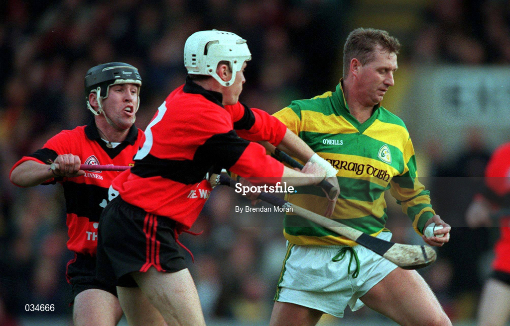 31 October 1999; Jim Cashman of Blackrock in action against Eddie Enright, left, and Dave Bennett of UCC during the Cork County Senior Club Hurling Championship Final match between Blackrock and UCC at Páirc Uí Chaoimh in Cork. Photo by Brendan Moran/Sportsfile