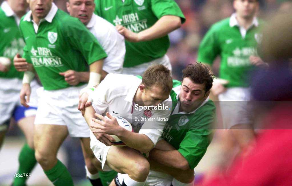 5 February 2000; Matt Dawson of England is tackled by Kieron Dawson of Ireland during the Lloyds TSB 6 Nations match between England and Ireland at Twickenham Stadium in London, England. Photo by Brendan Moran/Sportsfile