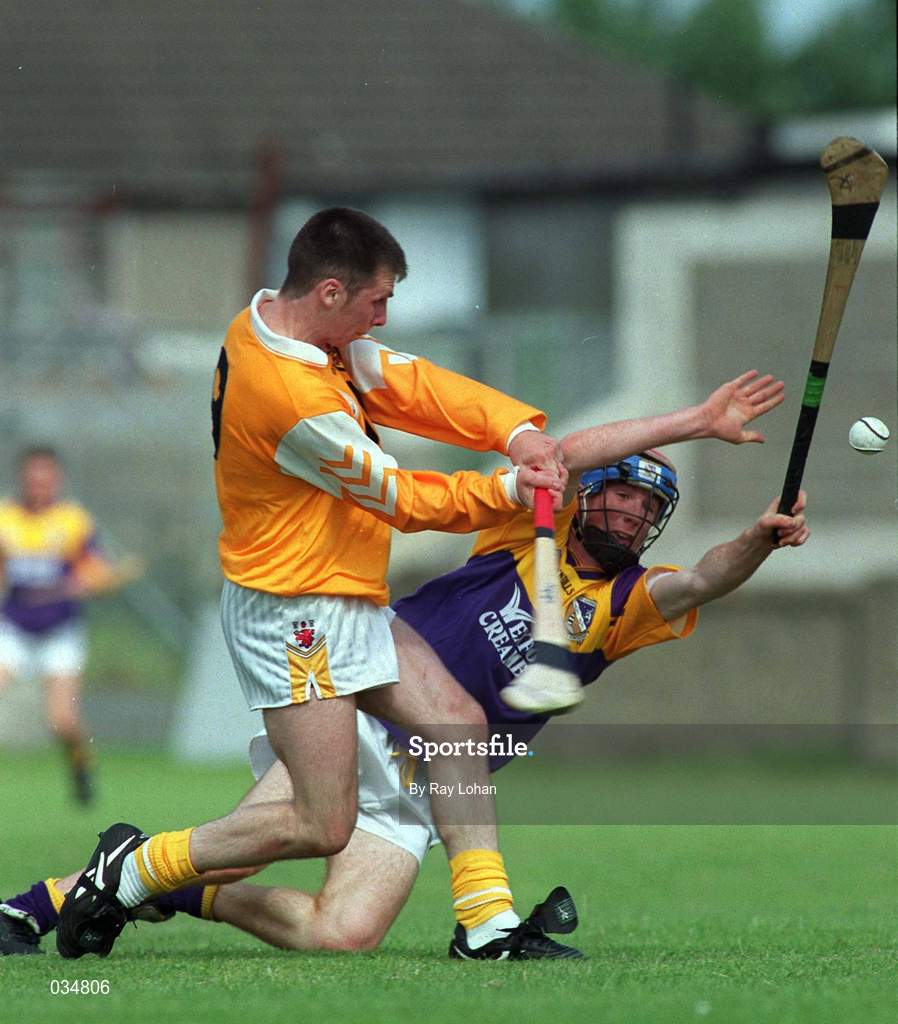 24 July 1999; Michael McClements of Antrim in action against Diarmuid Lyng of Wexford during the All-Ireland Minor Hurling Championship Quarter-Final match between Antrim and Wexford at Parnell Park in Dublin. Photo by Ray Lohan/Sportsfile