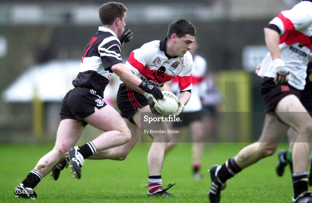 12 December 1999; Michael O'Croinin, UCC in action against Philip Smith, Doonbeg, during the AIB Munster Club Senior Football Championship Final, Doonbeg v U.C.C. Picture credit; Matt Browne/SPORTSFILE *(EDI)* *** Local Caption *** 12 December 1999; xxx during the AIB Munster Senior Club Football Championship Final match between UCC and Doonbeg at the Gaelic Grounds in Limerick. Photo by Brendan Moran/Sportsfile