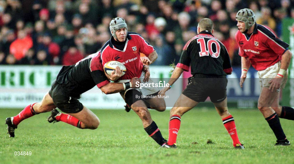 8 January 2000; Mike Mullins of Munster in action against Francois Pienarr and theirry Lacroix, right, of Saracens during the Heineken Cup Pool 4 Round 5 match between Munster and Saracens at Thomond Park in Limerick. Photo by Brendan Moran/Sportsfile