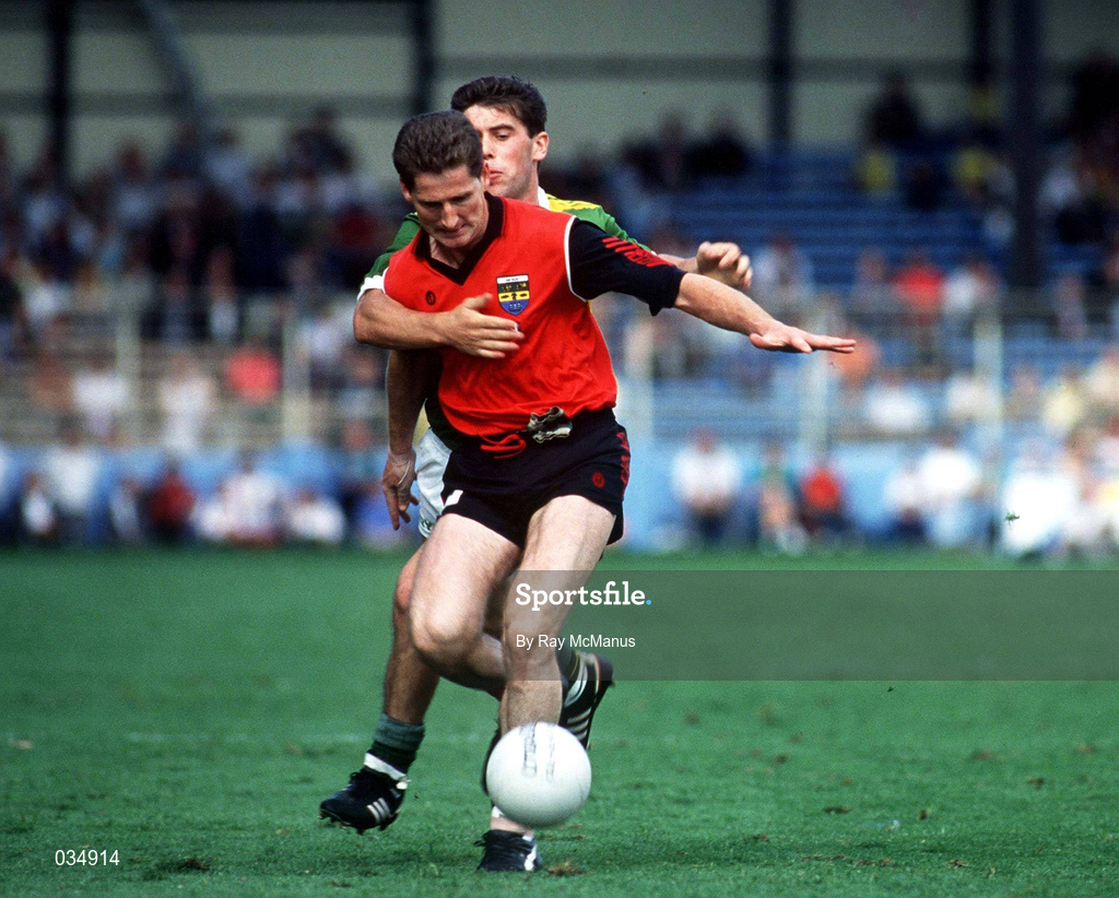 11 August 1991; Paddy O'Rourke of Down is tackled by John Cronin of Kerry during the All-Ireland Senior Football Championship Semi-Final between Down and Kerry at Croke Park in Dublin. Photo by Ray McManus/Sportsfile