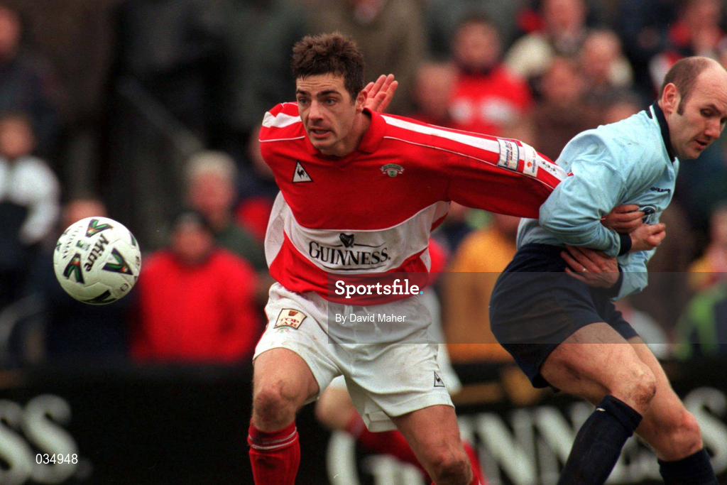 5 December 1999; Mark Herrick of Cork City is tackled by Paul Doolin of Shelbourne during the Eircom League Premier Division match between Cork City and Shelbourne at Turners Cross in Cork. Photo by David Maher/Sportsfile