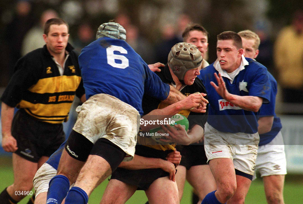 26 February 2000; Paul O'Connell of Young Munster is tackled by Trevor Brennan, 6, and Fergal Campion of St Mary's during the AIB League Division 1 match between St Mary's and Young Munster at Templeville Road in Dublin. Photo by Matt Browne/Sportsfile