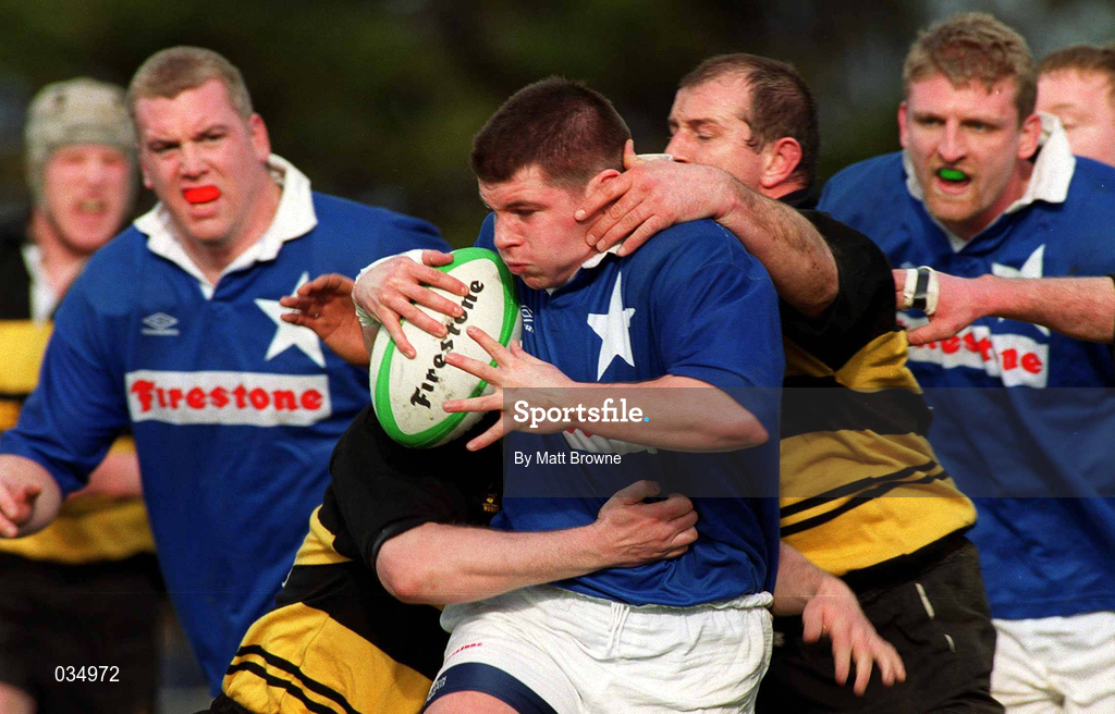 26 February 2000; Peter Smyth of St Mary's is tackled by Mike Prendergast, left, and Peter Clohessy, right, of Young Munster during the AIB League Division 1 match between St Mary's and Young Munster at Templeville Road in Dublin. Photo by Matt Browne/Sportsfile