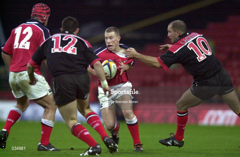 28 November 1999; Peter Stringer of Munster in action against theirry Lacroix and Kevin Sorrell, 12, of Saracens during the Heineken Cup Pool 4 match at Vicarage Road in Watford, London. Photo by Brendan Moran/Sportsfile