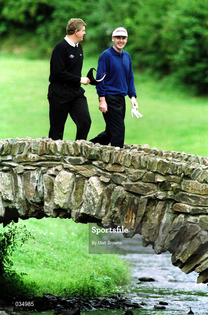 2 July 1999; Phil Price shares a joke with Colin Montgomerie on their way to the 13th green during day two of the Murphy's Irish Open at Druids Glen in Wicklow. Photo by Matt Browne/Sportsfile