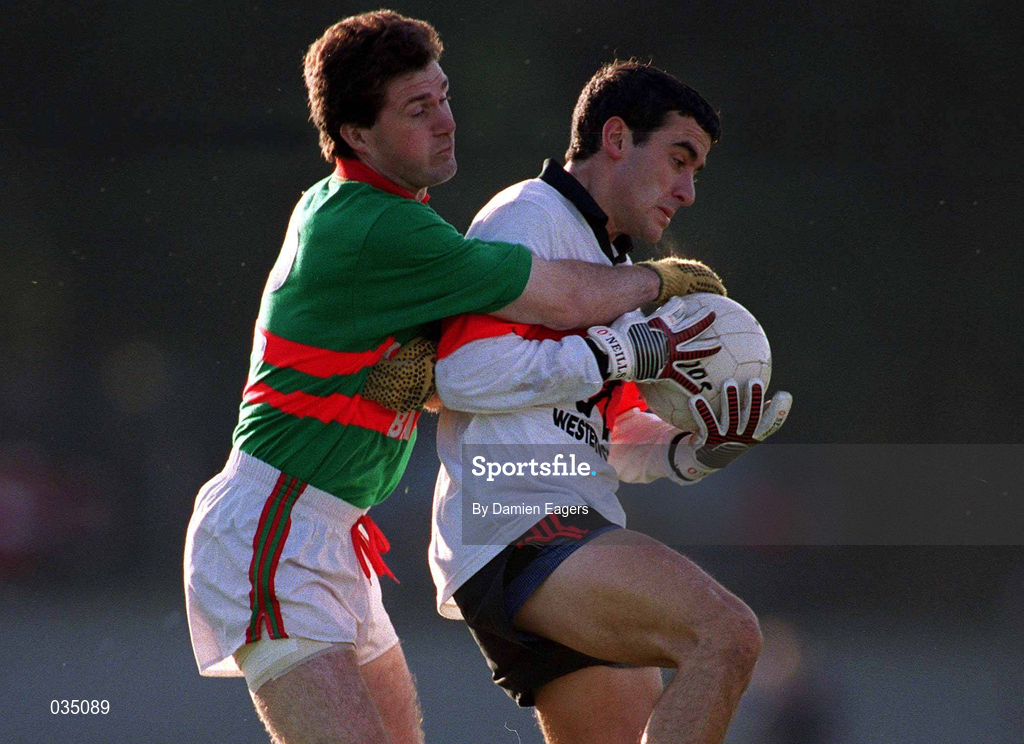 20 November 1999; Séamus Downey of UCC in action against Joe Murray of Rathgormack during the AIB Munster Senior Club Football Championship Semi-Final match between Rathgormack and UCC at Páirc Uí Rinn in Cork. Photo by Damien Eagers/Sportsfile