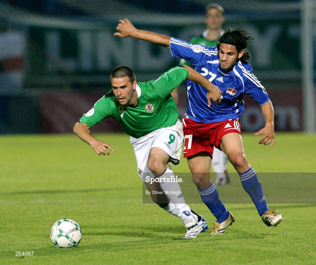 22 August 2007; David Healy, Northern Ireland, in action against Michele Polverino, Liechtenstein. 2008 European Championship Qualifier, Group F, Northern Ireland v Liechtenstein, Windsor Park, Belfast, Co. Antrim. Picture credit: Oliver McVeigh / SPORTSFILE