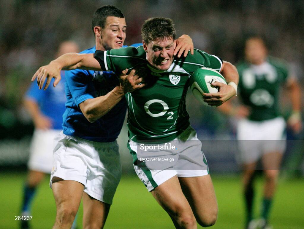 24 August 2007; Ronan O'Gara, Ireland, goes over for the winning try despite the tackle of Kaine Robertson, Italy. Rugby World Cup Warm-Up Game, Ireland v Italy, Ravenhill Park, Belfast, Co. Antrim. Picture credit: Oliver McVeigh / SPORTSFILE