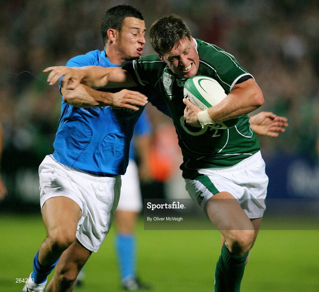 24 August 2007; Ronan  O'Gara, Ireland, goes over for the winning try despite the tackle of Kaine Robertson, Italy. Rugby World Cup Warm-Up Game, Ireland v Italy, Ravenhill Park, Belfast, Co. Antrim. Picture credit: Oliver McVeigh / SPORTSFILE