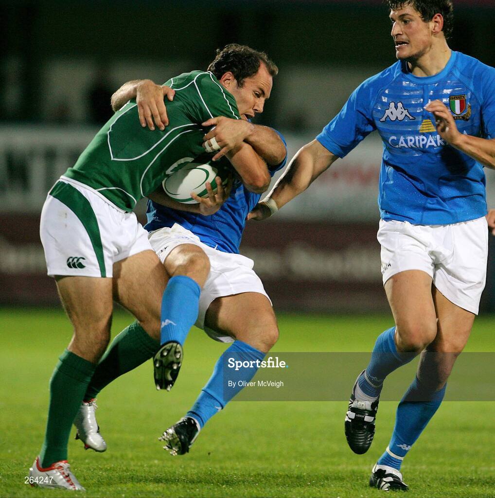 24 August 2007; Girvan Dempsey, Ireland, is tackled by Alessandro Troncon, Italy. Rugby World Cup Warm-Up Game, Ireland v Italy, Ravenhill Park, Belfast, Co. Antrim. Picture credit: Oliver McVeigh / SPORTSFILE