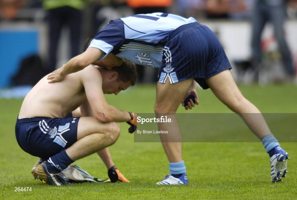 26 August 2007; Dublin's Conal Keaney, left, is consoled by team-mate Jason Sherlock after defeat to Kerry. Bank of Ireland All-Ireland Senior Football Championship Semi Final, Dublin v Kerry, Croke Park, Dublin. Picture credit: Brian Lawless / SPORTSFILE