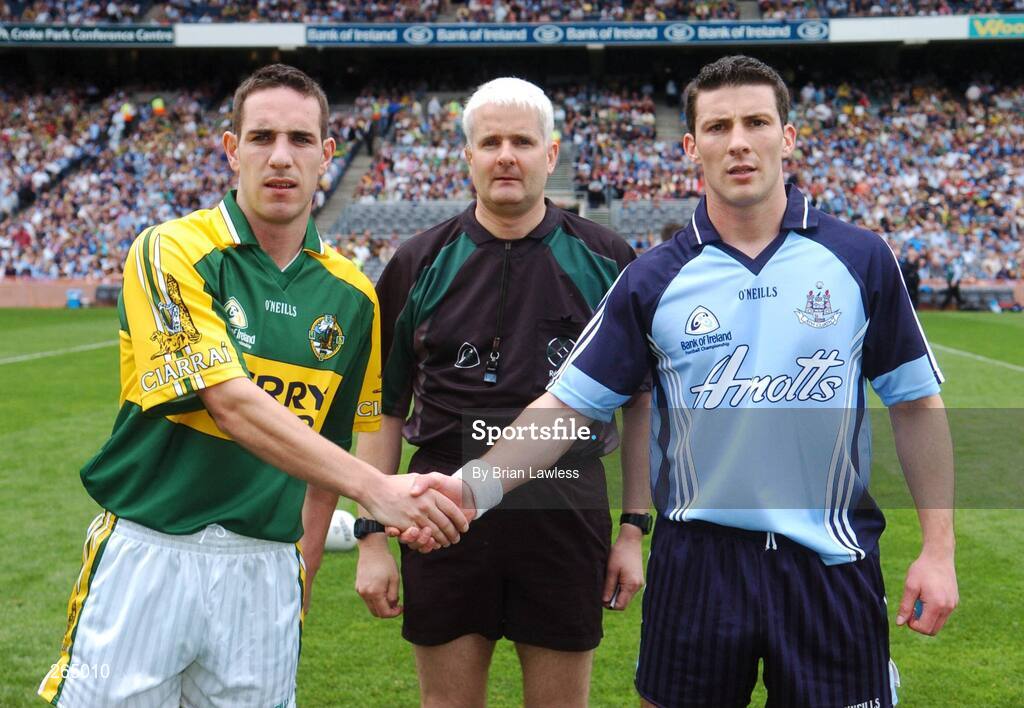 26 August 2007; Kerry captain Declan O'Sullivan and Dublin captain Colin Moran shake hands in the company of referee John Bannon before the match. Bank of Ireland Senior Football Championship Semi Final, Dublin v Kerry, Croke Park, Dublin. Picture credit: Brian Lawless / SPORTSFILE