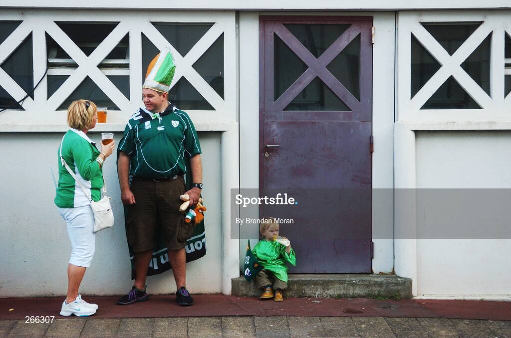 9 September 2007; 19 month old Kathleen Rose Keaney with her uncle Kevin Keaney, from Brighton, England, and Susan Quinn, from Limeick, take a refreshment break before the game. 2007 Rugby World Cup, Pool D, Ireland v Namibia, Stade Chaban Delmas, Bordeaux, France. Picture credit; Brendan Moran / SPORTSFILE