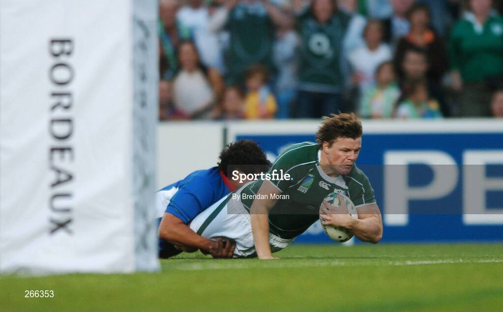 9 September 2007; Brian O'Driscoll, Ireland, scores his side's first try despite the tackle of Tertius Losper, Namibia. 2007 Rugby World Cup, Pool D, Ireland v Namibia, Stade Chaban Delmas, Bordeaux, France. Picture credit; Brendan Moran / SPORTSFILE