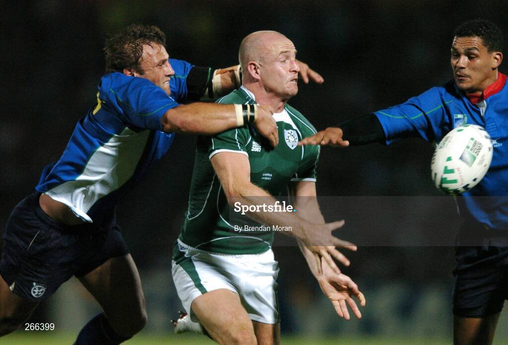 9 September 2007; Denis Hickie, Ireland, gets the ball away while under pressure from Piet Van Zyl, left, and Eugene Jantjies, Namibia. 2007 Rugby World Cup, Pool D, Ireland v Namibia, Stade Chaban Delmas, Bordeaux, France. Picture credit; Brendan Moran / SPORTSFILE