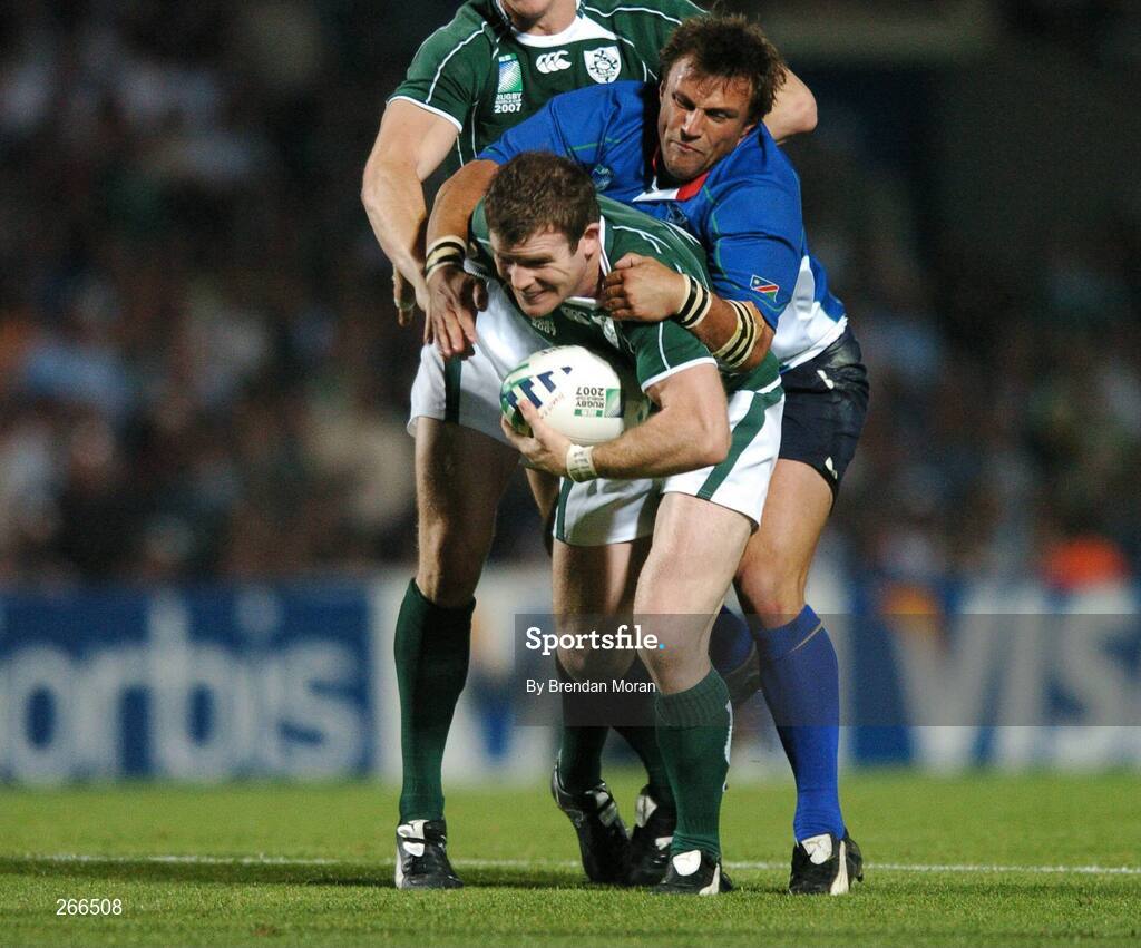 9 September 2007; Gordon D'Arcy, Ireland, is tackled by Piet Van Zyl, Namibia. 2007 Rugby World Cup, Pool D, Ireland v Namibia, Stade Chaban Delmas, Bordeaux, France. Picture credit; Brendan Moran / SPORTSFILE