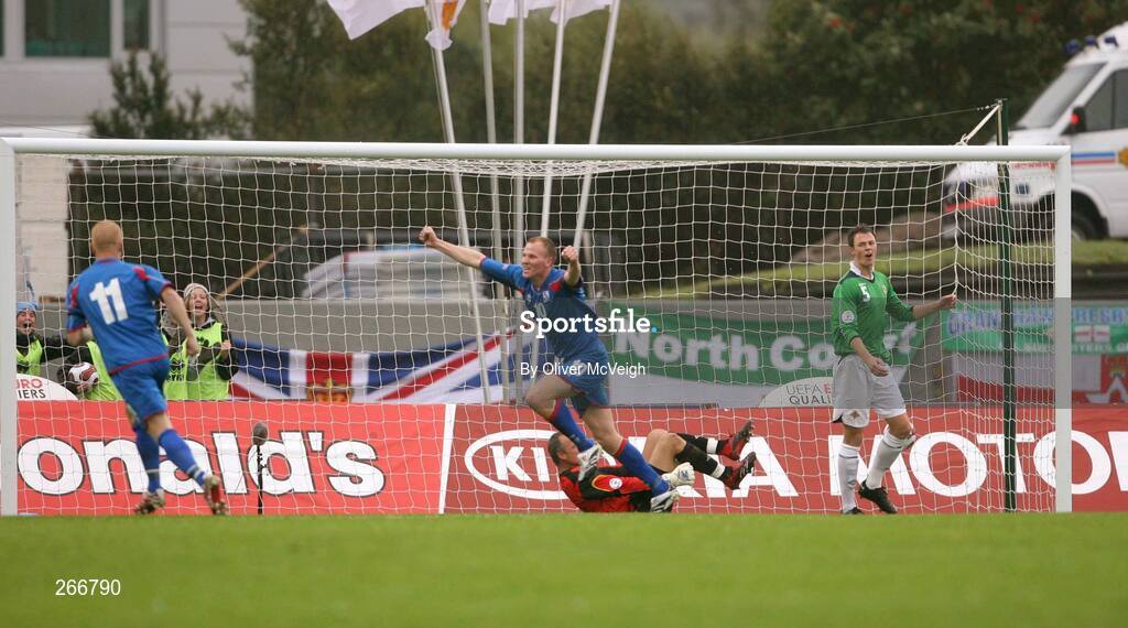 12 September 2007; Dejected Northern Ireland players Maik Taylor and Johnny Evans, right, look on as Armann Bjornsson, Iceland, turns to celebrate after scoring his sides first goal. 2008 European Championship Qualifier, Iceland v Northern Ireland, Laugardalsvollur Stadium, Reykjavik, Iceland. Picture credit; Oliver McVeigh / SPORTSFILE