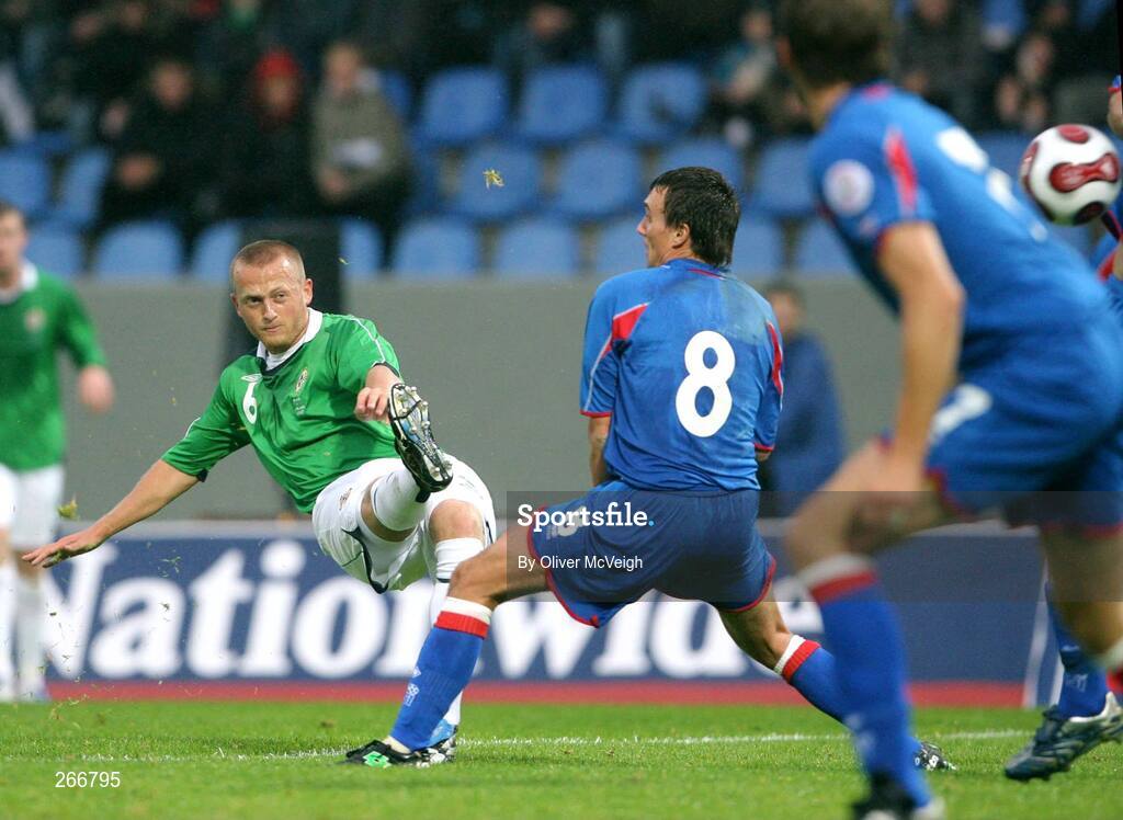 12 September 2007; Sammy Clingan, Northern Ireland, shoots past Arnar Vidarsson, Iceland. 2008 European Championship Qualifier, Iceland v Northern Ireland, Laugardalsvollur Stadium, Reykjavik, Iceland. Picture credit; Oliver McVeigh / SPORTSFILE