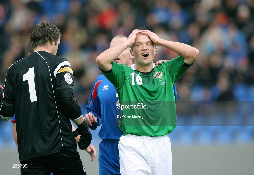 12 September 2007; Warren Feeney, Northern Ireland, holds his head after a near miss. 2008 European Championship Qualifier, Iceland v Northern Ireland, Laugardalsvollur Stadium, Reykjavik, Iceland. Picture credit; Oliver McVeigh / SPORTSFILE