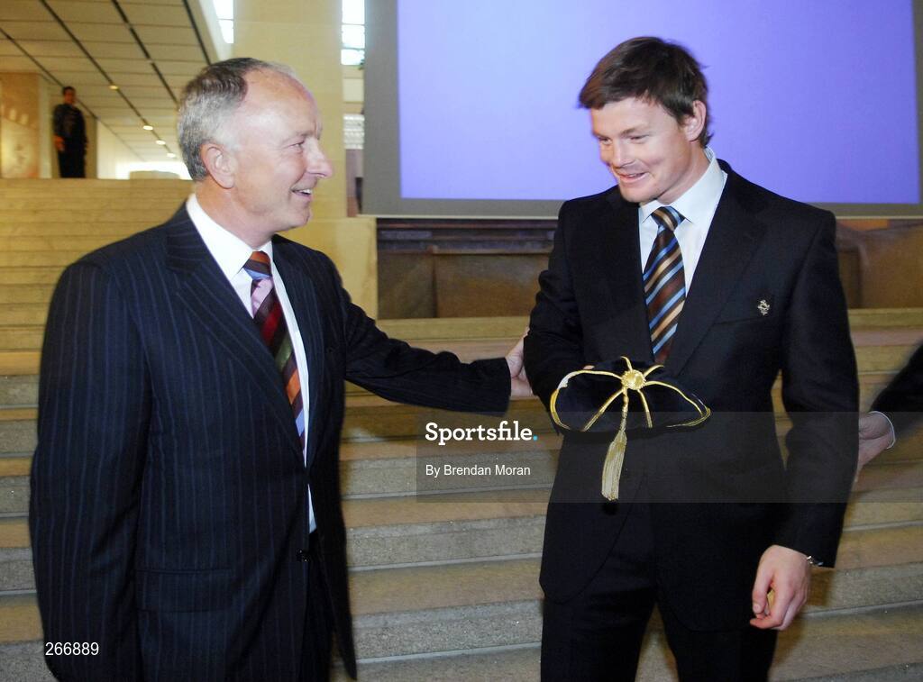 13 September 2007; Ireland captain Brian O'Driscoll with Minister for Foreign Affairs, Dermot Ahern, TD, at a reception where the Ireland squad received their World Cup caps. 2007 Rugby World Cup, Pool D, Conceill Regional D'Aquitaine, Bordeaux, France. Picture credit: Brendan Moran / SPORTSFILE