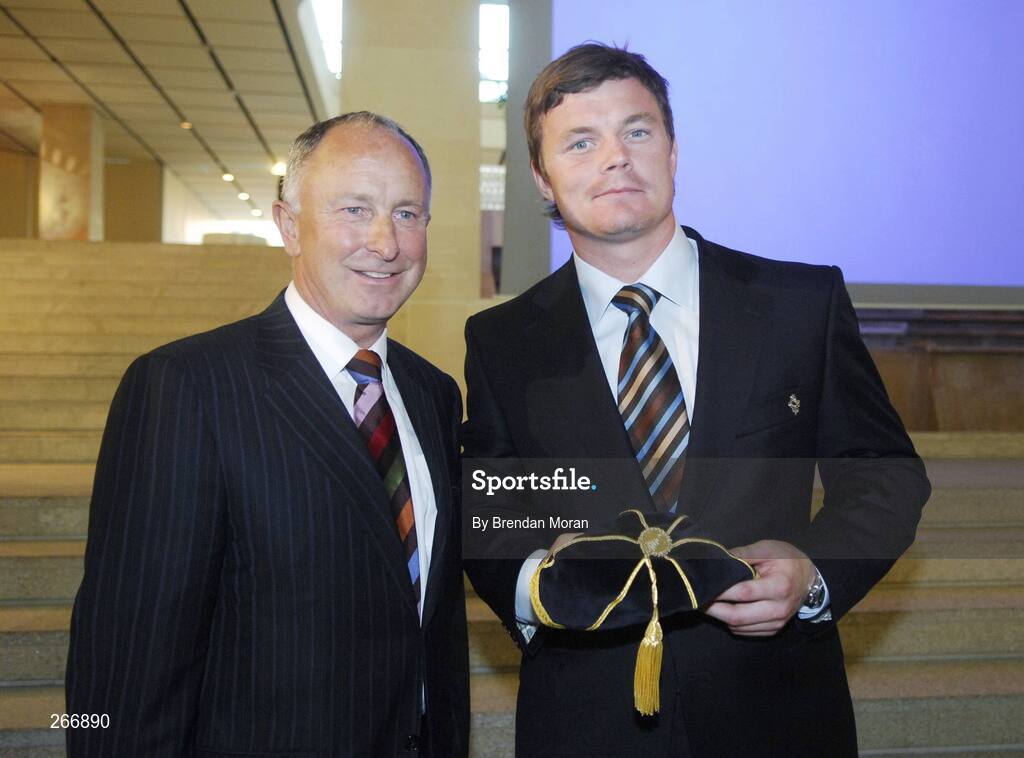 13 September 2007; Ireland captain Brian O'Driscoll with Minister for Foreign Affairs, Dermot Ahern, TD, at a reception where the Ireland squad received their World Cup caps. 2007 Rugby World Cup, Pool D, Conceill Regional D'Aquitaine, Bordeaux, France. Picture credit: Brendan Moran / SPORTSFILE