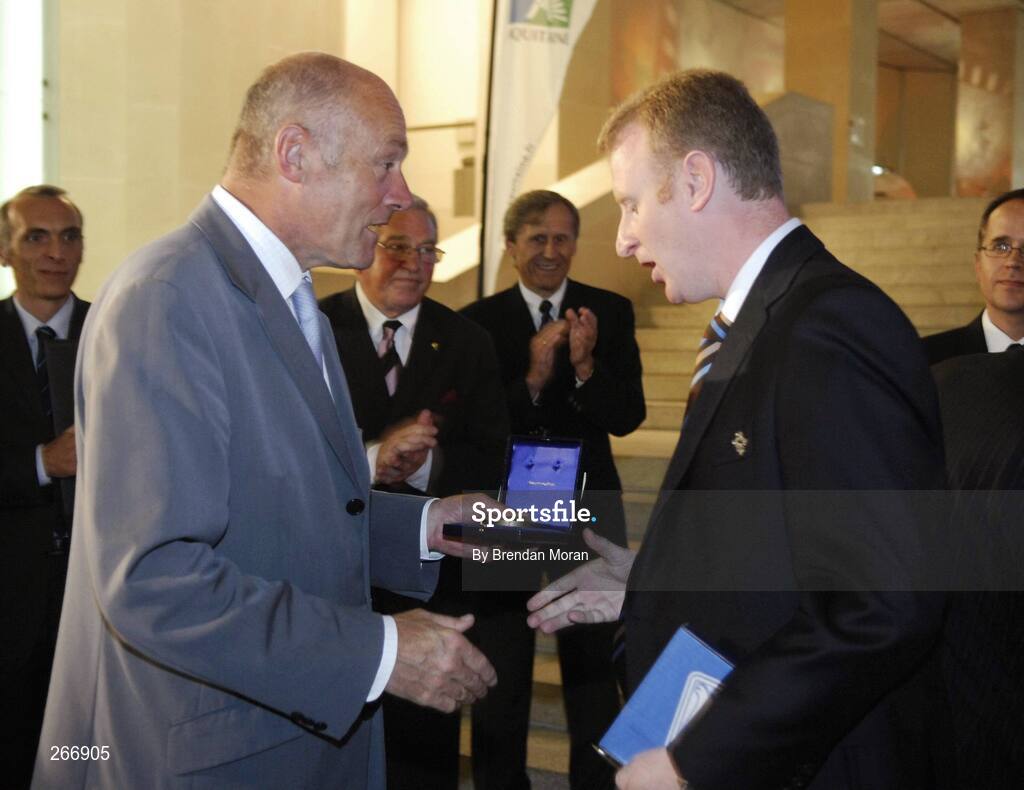 13 September 2007; Ireland team manager Ger Carmody is presented with a momento by Alain Rousset, President, Conceil Regional D'Aquitaine, at a reception where the Ireland squad received their World Cup caps. 2007 Rugby World Cup, Pool D, Conceil Regional D'Aquitaine, Bordeaux, France. Picture credit: Brendan Moran / SPORTSFILE