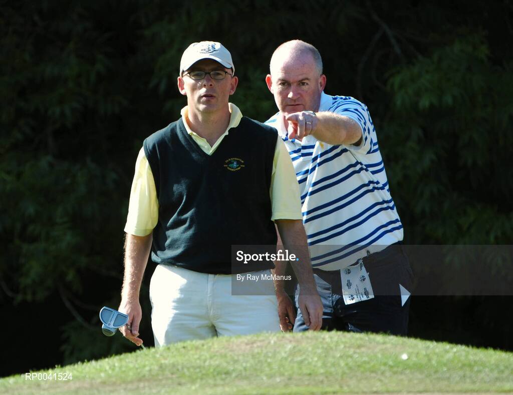15 September 2007; Seryth Heavey, Co. Sligo Golf Club, and his caddy Padraig Heavey, right, line up a putt on the 10th green during the Bulmers Senior Cup Final. Bulmers Cups and Shields Finals 2007, Shandon Park Golf Club, Belfast, Co. Antrim. Picture credit: Ray McManus / SPORTSFILE