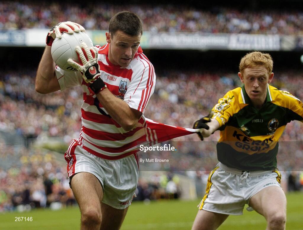 16 September 2007; Alan Quirke, Cork, has is jersey tugged by Colm Cooper, Kerry. Bank of Ireland All-Ireland Senior Football Championship Final, Kerry v Cork, Croke Park, Dublin. Picture credit; Matt Browne / SPORTSFILE