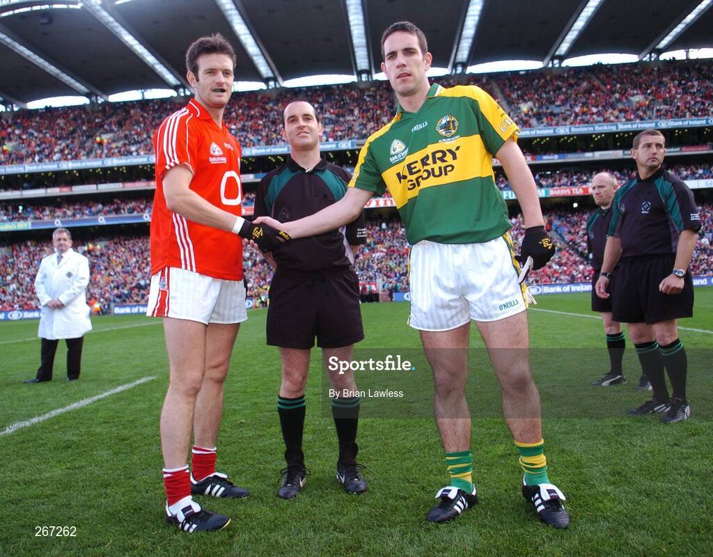 16 September 2007; Kerry captain Declan O'Sullivan and Cork captain Derek Kavanagh shake hands in the company of referee David Coldrick. Bank of Ireland All-Ireland Senior Football Championship Final, Kerry v Cork, Croke Park, Dublin. Picture credit; Brian Lawless / SPORTSFILE