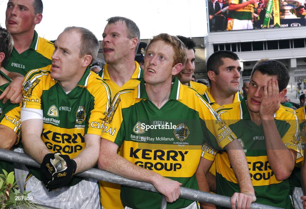 16 September 2007; Kerry players, from left, Kieran Donaghy, Mossie Lyons, Diarmuid Murphy, Colm Cooper, Tom O'Sullivan, partially hidden, Kieran Cremin and Eoin Brosnan, watch on as captain Declan O'Sullivan is presented with the Sam Maguire Cup. Bank of Ireland All-Ireland Senior Football Championship Final, Kerry v Cork, Croke Park, Dublin. Picture credit; Ray McManus / SPORTSFILE