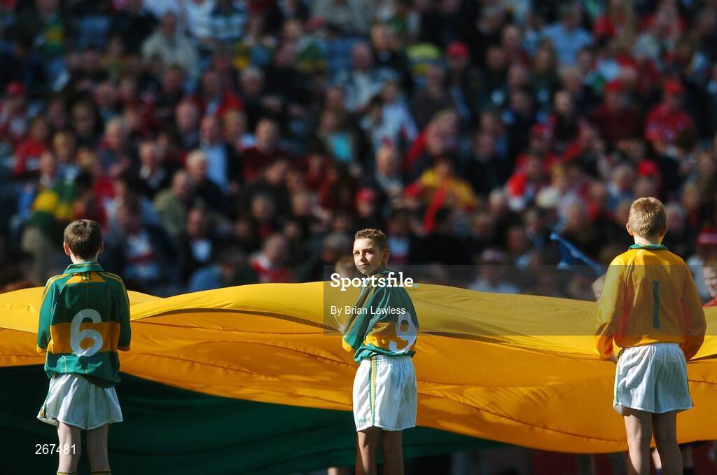 16 September 2007; A young flag bearer takes in the atmosphere before the start of the match. Bank of Ireland All-Ireland Senior Football Championship Final, Kerry v Cork, Croke Park, Dublin. Picture credit; Brian Lawless / SPORTSFILE