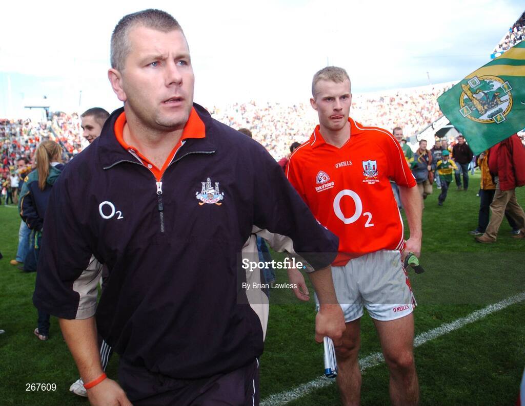 16 September 2007; Cork hurler Diarmuid O'Sullivan with a dejected Michael Shields after the match. Bank of Ireland All-Ireland Senior Football Championship Final, Kerry v Cork, Croke Park, Dublin. Picture credit; Brian Lawless / SPORTSFILE