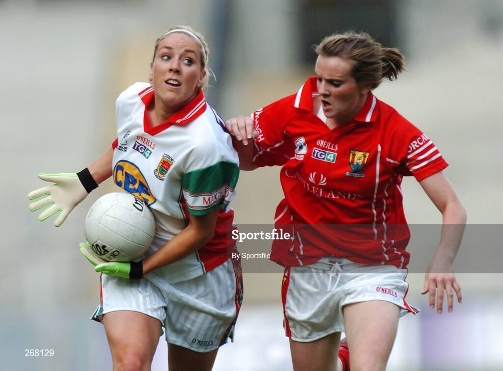 23 September 2007; Ciara McDermott, Mayo, in action against Briege Corkery, Cork. TG4 All-Ireland Ladies Senior Football Championship Final, Cork v Mayo, Croke Park, Dublin. Picture credit; Paul Mohan / SPORTSFILE