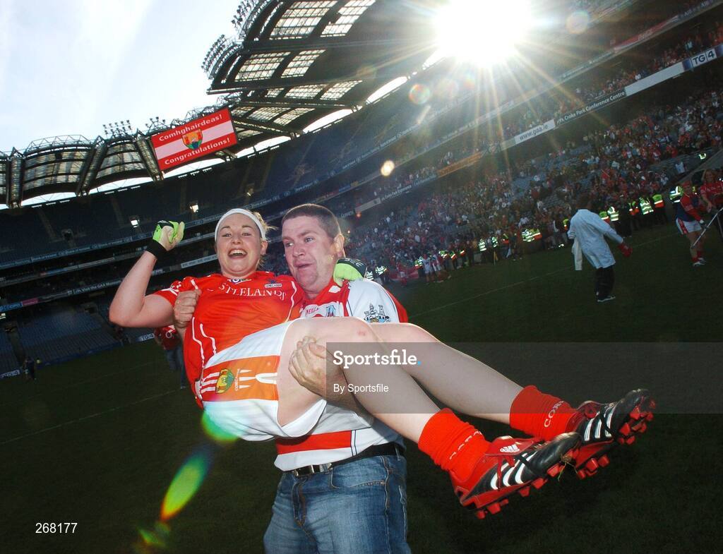 23 September 2007; Cork fan Kevin Harrington lifts up Cork player Amanda Murphy at the end of the game. TG4 All-Ireland Ladies Senior Football Championship Final, Cork v Mayo, Croke Park, Dublin. Picture credit; Paul Mohan / SPORTSFILE