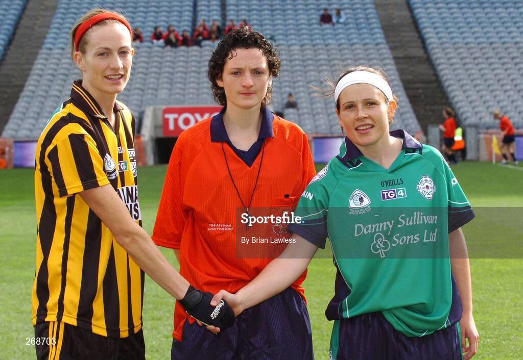 23 September 2007; Kilkenny captain Caitriona Grace and London captain Bree White shake hands in the company of referee Maggie Farrelly. TG4 All-Ireland Ladies Junior Football Championship Final, London v Kilkenny, Croke Park, Dublin. Picture credit; Brian Lawless / SPORTSFILE