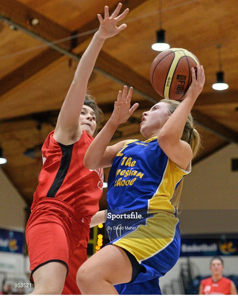 20 January 2015; Rachel Leavy, The Teresian School, in action against Jenna Stacey, Glanmire Community College. All-Ireland Schools Cup U19B Girls Final, The Teresian School v Glanmire Community College, National Basketball Arena, Tallaght, Dublin. Picture credit: David Maher / SPORTSFILE