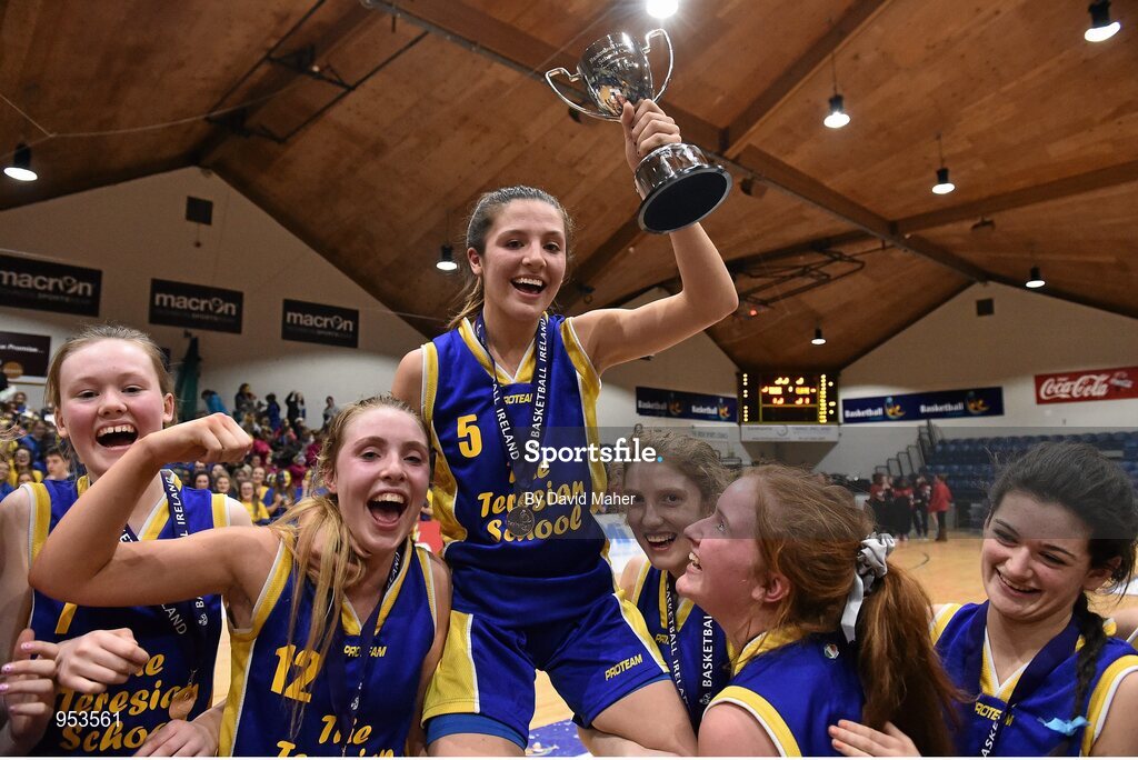 20 January 2015; The Teresian School joint captain Sophie Barron is lifted shoulder high by her team-mates at the end of the game. All-Ireland Schools Cup U19B Girls Final, The Teresian School v Glanmire Community College, National Basketball Arena, Tallaght, Dublin. Picture credit: David Maher / SPORTSFILE