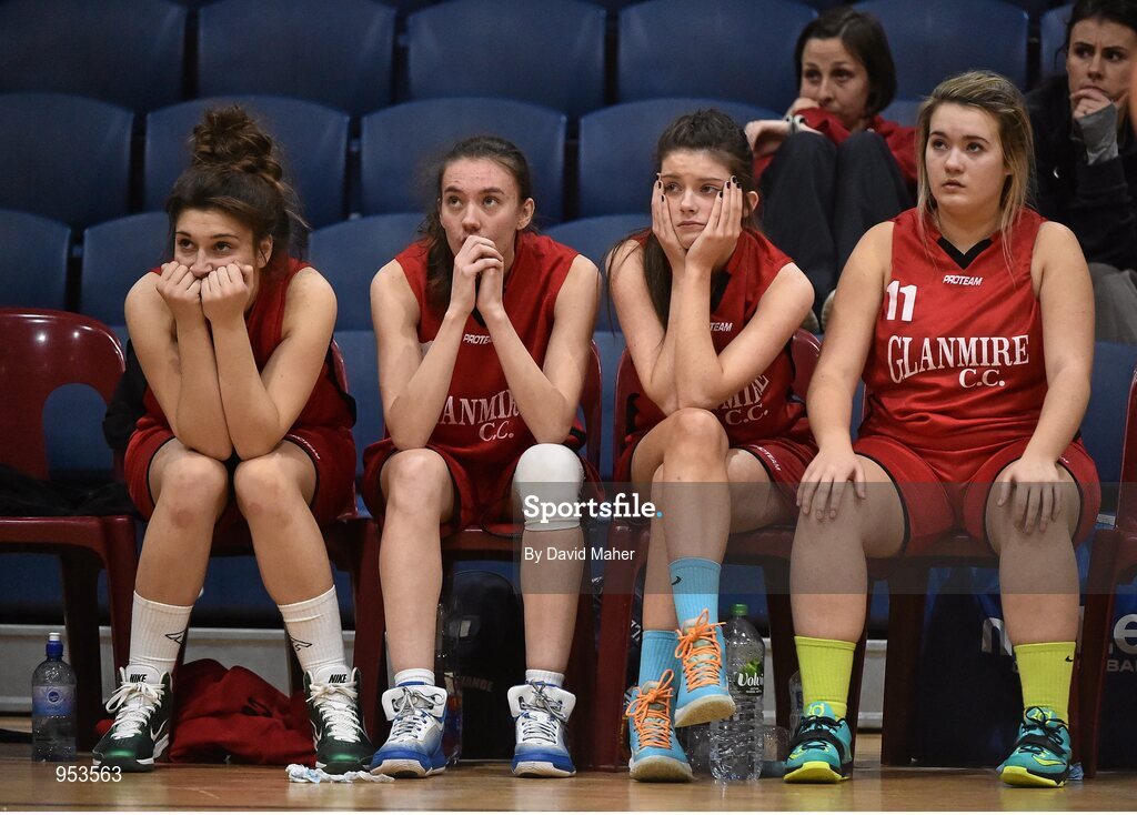 20 January 2015; Dejected Glanmire Community College players, from left, Jenna Stacey, Audrey Murphy, Claire Gillen and Aisling Murray during the last minute of the game. All-Ireland Schools Cup U19B Girls Final, The Teresian School v Glanmire Community College, National Basketball Arena, Tallaght, Dublin. Picture credit: David Maher / SPORTSFILE